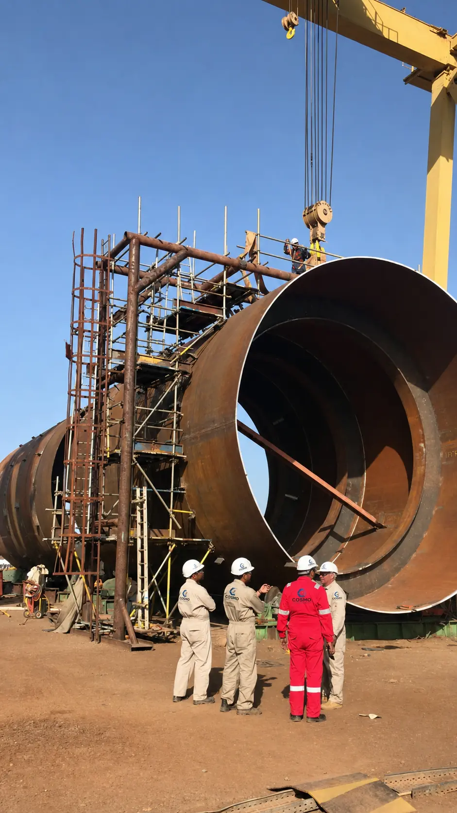 Fabricated industrial equipment shell and Cosmo Engineering team