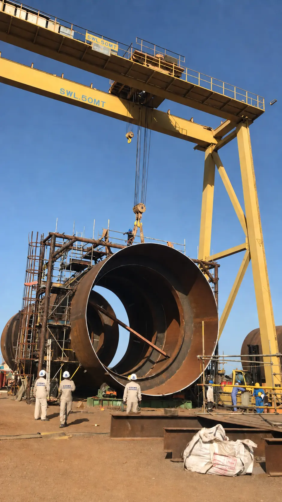 Eight-metre-diameter Samsung LPG storage bullet shell section under gantry cranes in Sohar, Oman